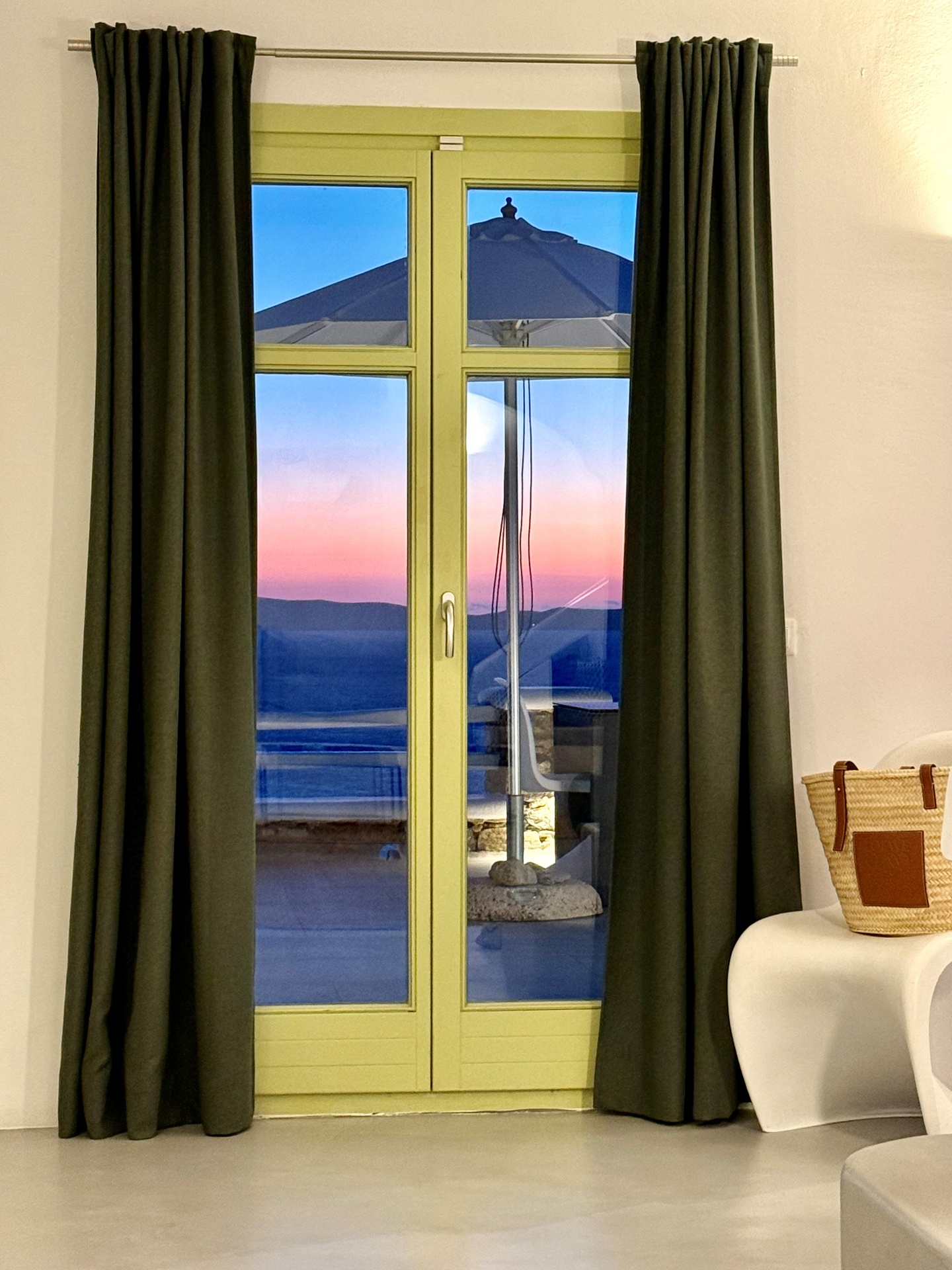 Villa AGNES green window frame at sunset