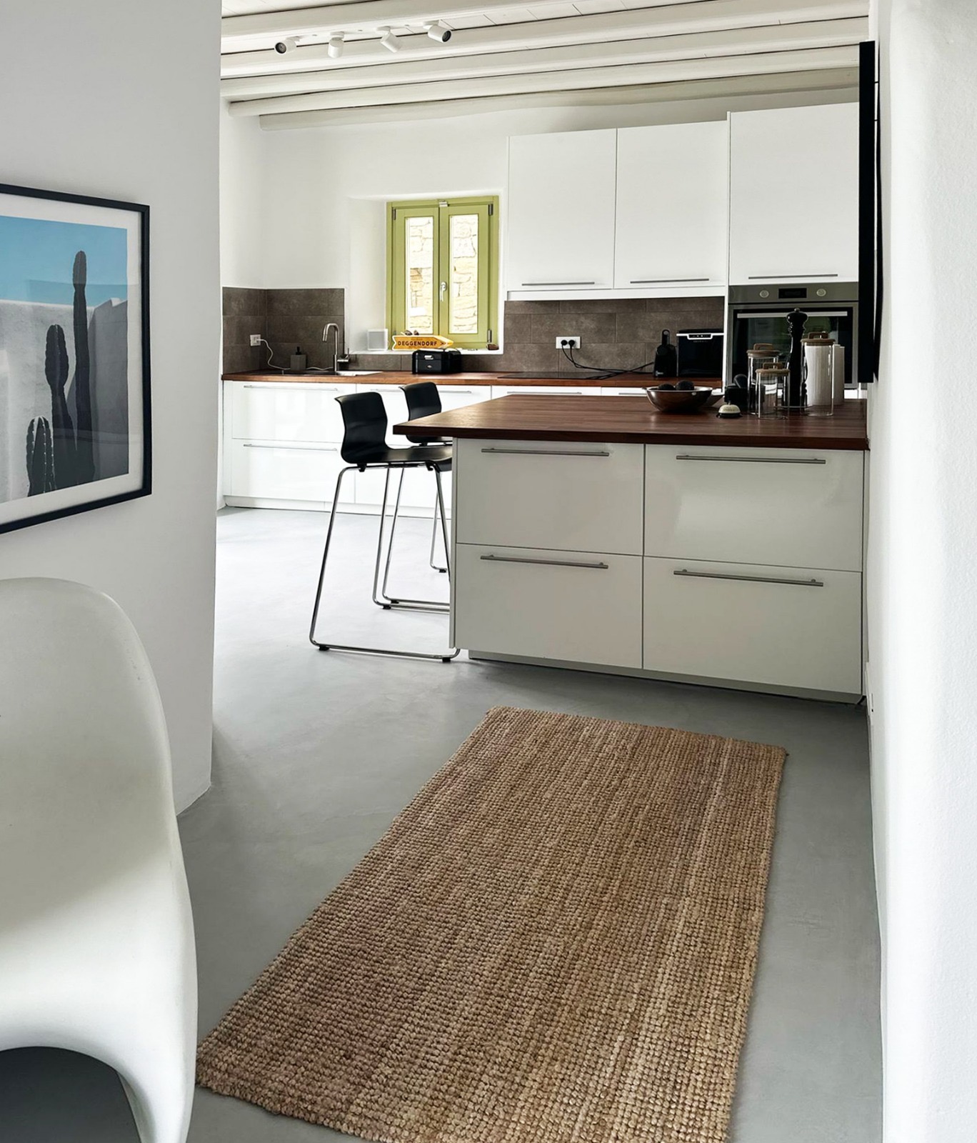 Villa AGNES open kitchen with walnut island and bar stools