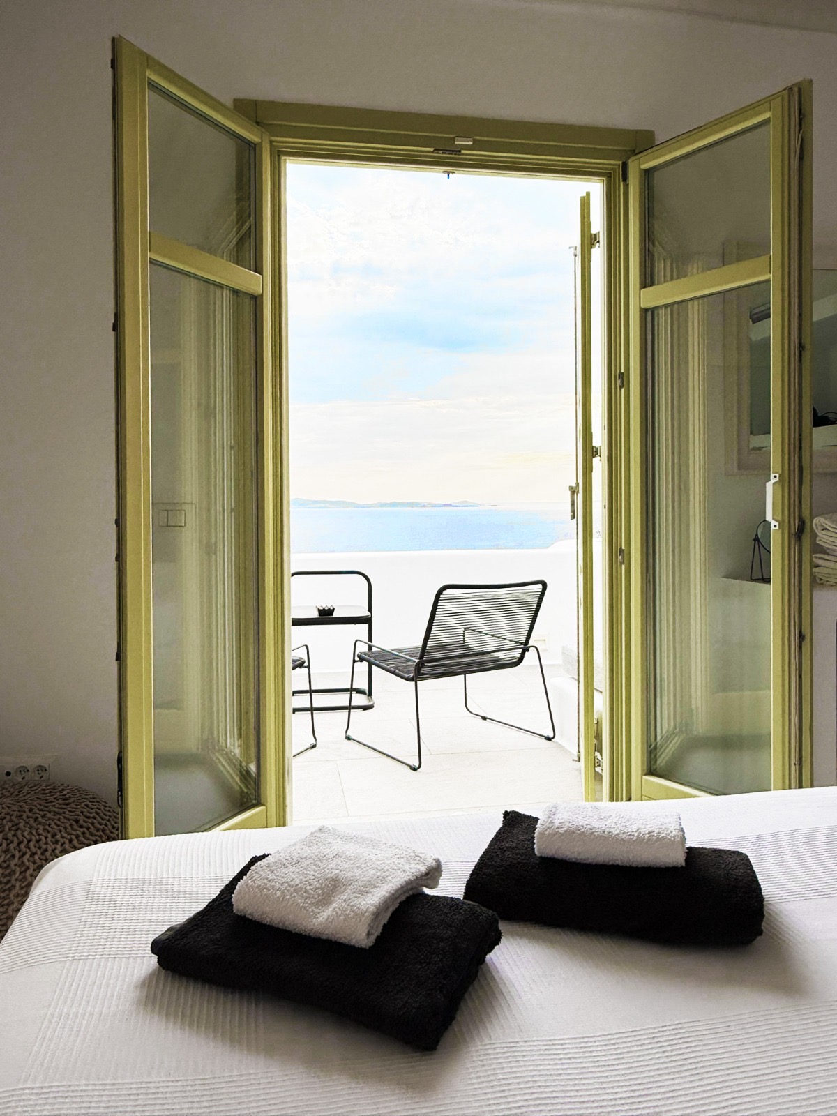 Villa AGNES bedroom opening onto sea-view balcony