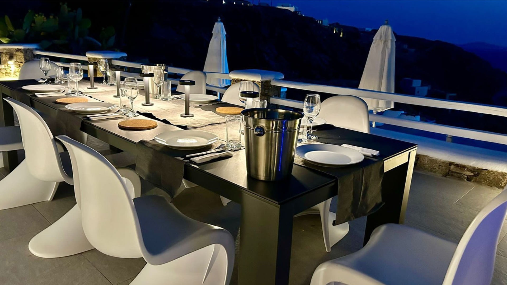 Villa AGNES outdoor dining table at dusk